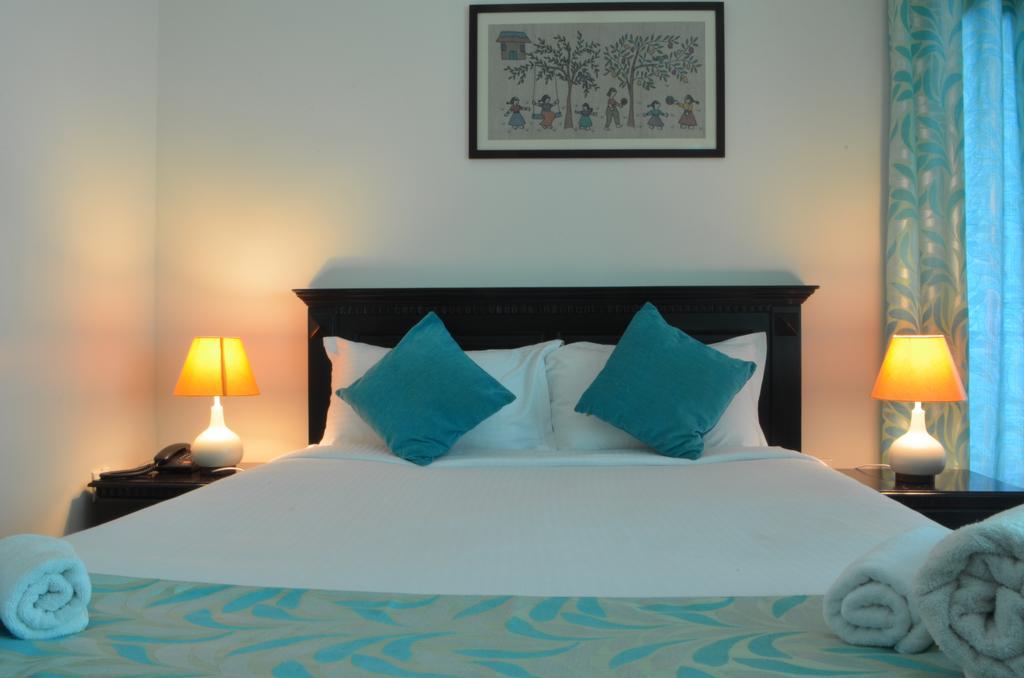 Luxtay Suites Bangalore Zimmer foto