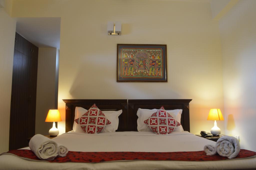 Luxtay Suites Bangalore Zimmer foto